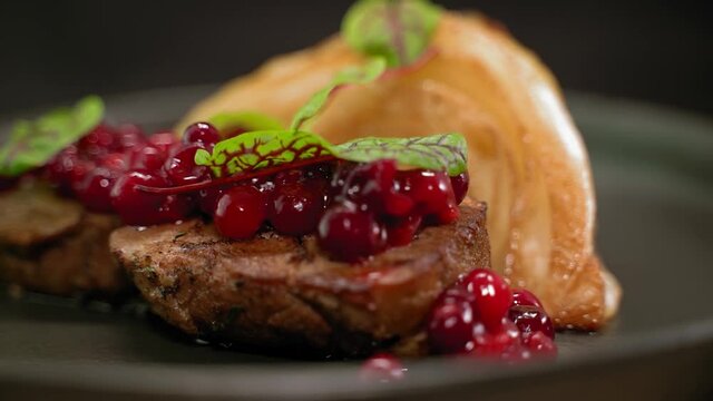 Steak with cranberry jam close up1