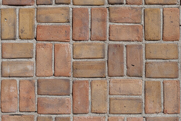 Brick wall background with bricks in a square shape pattern, copy space