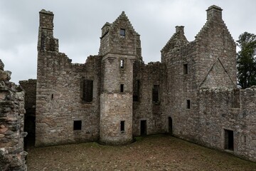 Fototapeta na wymiar Courtyard of Tolquhon Castlemedieval ruins in Tarves, Ellon, Scotland in overcast weather
