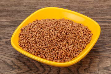 Raw buсkwheat cereal in the bowl