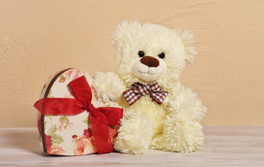 Teddy bear with heart box. Valentines Day background.