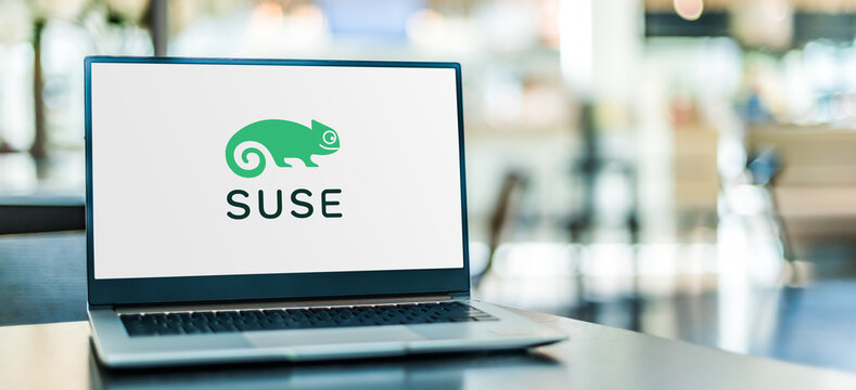 Laptop computer displaying logo of SUSE