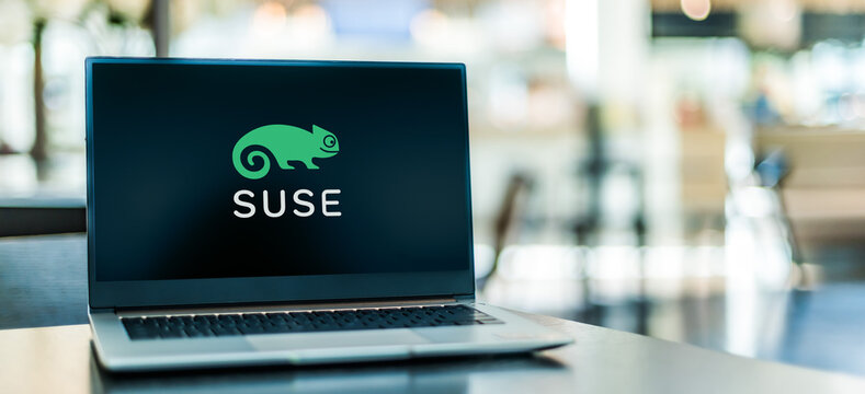 Laptop computer displaying logo of SUSE