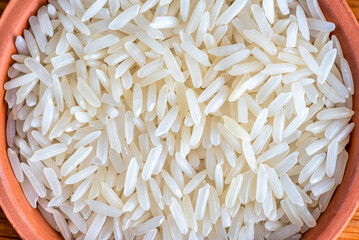 Real imperfect raw rice, top-down view