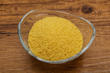 Raw cous cous heap in the bowl