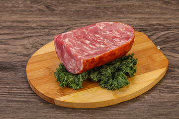 Beef ham piece over board