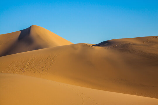 The twists of orange sand dunes