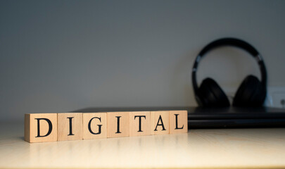 DIGITAL word inscription on wooden cube blocks