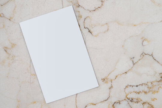 empty and blank business card,visiting card,calling card on marble table, close up, free copy space