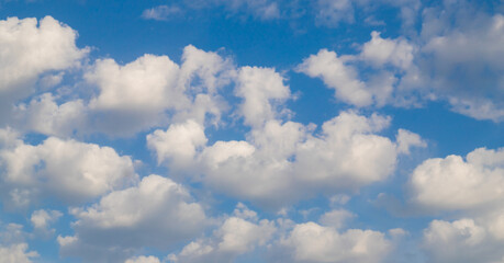 Blue sky background with clouds.