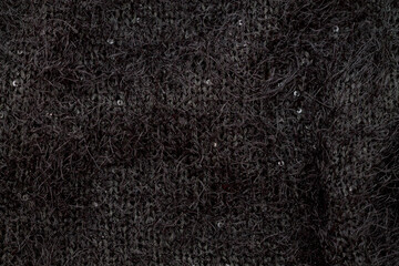 Fototapeta premium black knitted textile fabric made of wool