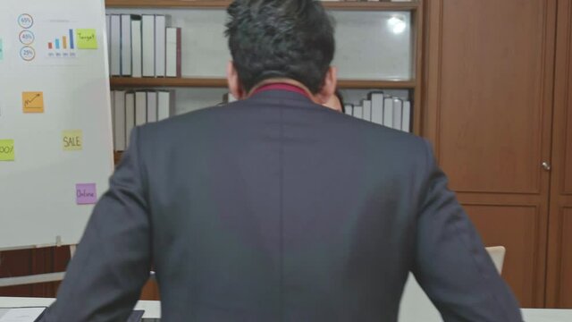 young businessman is fried by woman manager after presenting unsuccessful sales reported.
