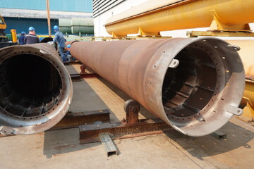 Reactor internals parts under preparation for maintenance in the area of industrial chemicals manufacturing plants.