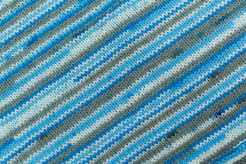 Knitted children's sweater on a white background