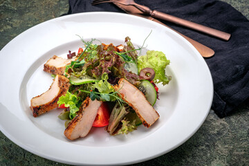 Healthy Grilled Chicken and green Salad with olive