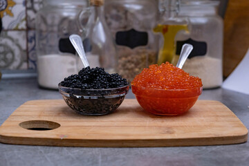 Fototapeta na wymiar black and red caviar in the caviar bowl