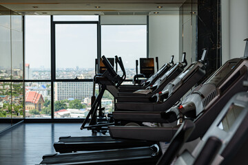 Fototapeta premium A lot of Electric Treadmill and equipment in fitness and gym.