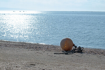 Fishing boat and the sea shining in the sun