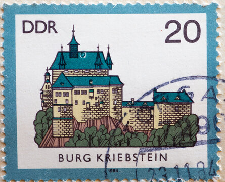 GERMANY, DDR - CIRCA 1984 : a postage stamp from Germany, GDR showing a drawing of the historic Kriebstein Castle (Hainichen district) (12th century)