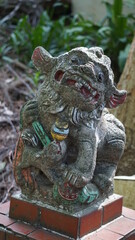 a guardian lion statue in the Hutoushan Hutou Mountain Park, Guishan, Taoyuan City, Taiwan, January