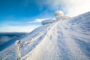 Fototapeta na wymiar peak of Sniezka mountain in Karkonosze in Poland and Czech republic border during winter