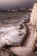 solo woman walking on undercliff at Brighton