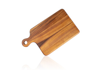 Wooden cutting board on a white background
