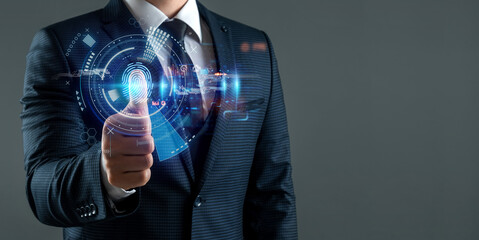 The man gains access to the personal information of the holograms with fingerprint identification. Modern technologies, cloud data storage.