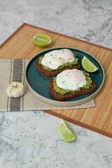 vegetarian toasts with guacamole and egg