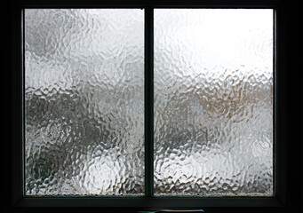 a frosted window in winter