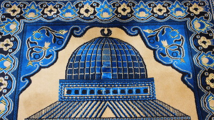 High angle view of lovely prayer mat or prayer rug for Muslims