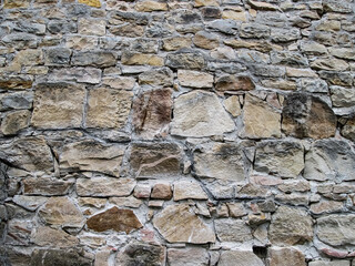 Stone texture with brown cobblestones. Solid home decoration.