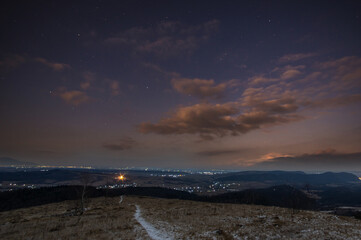 Clouds in the evening in winter in the sky over the mountains