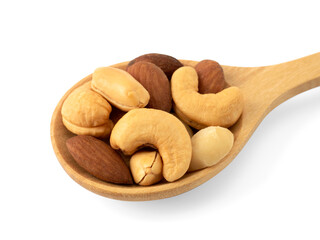 Organic cashew nuts, almond nuts and macadamia nuts and peanut  in wooden spoon isolated on White background. Mix nut healthy ingredients food.