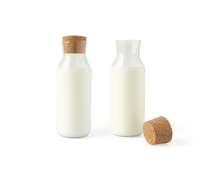 Organic milk in glass bottle front view isolated on white background for milk can improve health concept.