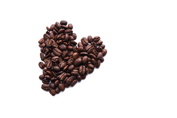 Heart shape made from coffee beans, love and coffee themed concept background photo isolated on white background. Top view, copy space for your text.