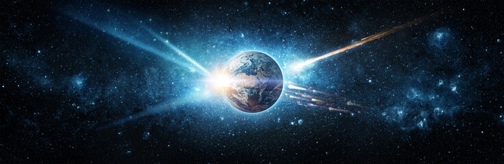 Comet, asteroid, meteorite flying to planet Earth on the starry night sky. Glowing asteroid and tail of a falling comet threatening the safety of the Earth. Elements of this image furnished by NASA.