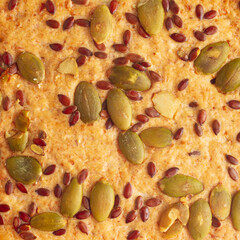 Cookies with pumpkin seeds and seeds and flax seeds close-up