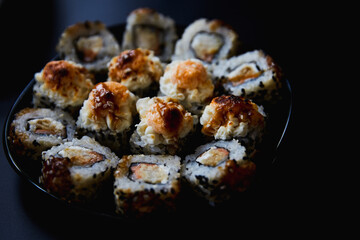 Close Up Set of Japanese sushi roll on dark background