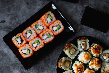 Set of Japanese sushi roll on dark background