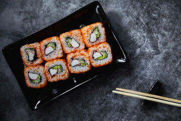 Set of Japanese sushi roll on dark background