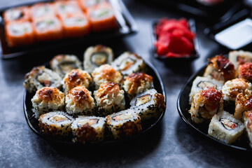 Set of Japanese sushi roll on dark background