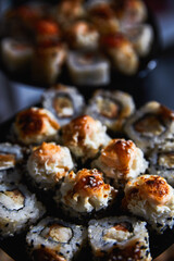 Set of Japanese sushi roll on dark background