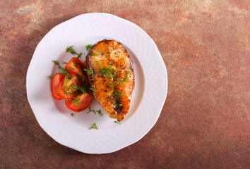 Fried grass carp steak served