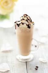 cup of cappuccino with chocolate