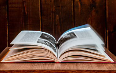 mysterious book on black background 