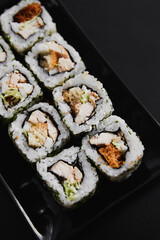 Close Up Set of Japanese sushi roll on dark background