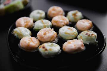 Close Up Set of Japanese sushi roll on dark background
