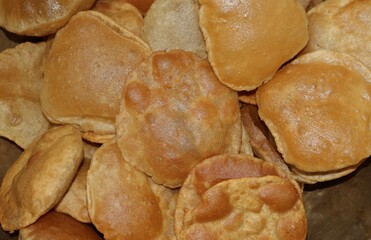 Stack of Fry Luchi Bread with Selective Focus,  Traditional Bengali Food