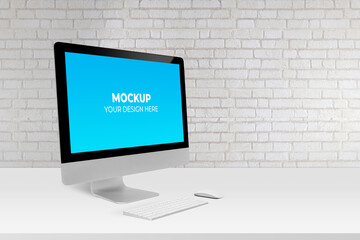 Mockup display screen blank computer on desk with white wall, office and workspace, monitor with empty, office and workplace in room, copy space, modern and minimalist, indoor, creativity and decor.